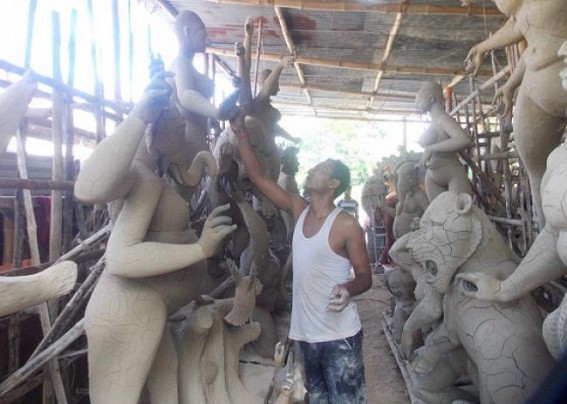 Kamalpur : Durga Puja Idol makers not hoping for a big smile